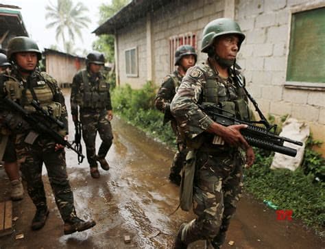 Philippine Officials Say 2 Americans Among Suspected Communist Rebels Killed in Clash with Troops