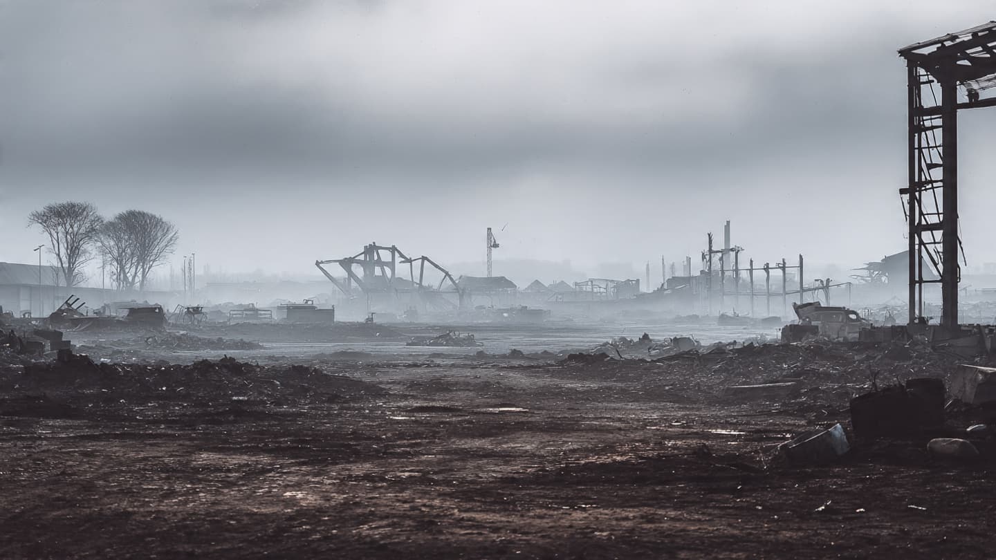 Where the Echo of Industry Fades Into the Grey, Reflections on a Shattered Evening Sky