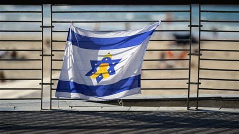 Polish MP Ignites Controversy by Displaying Israeli Flag Defaced with Swastika