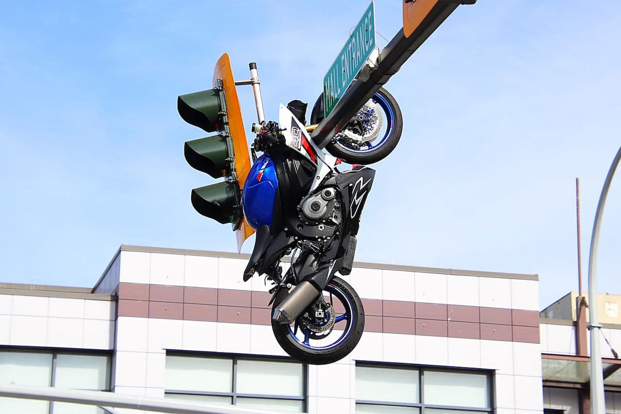 Motorcyclist Seriously Injured in Crash Leaves Bike Dangling from Traffic Light near Surrey-Delta Border