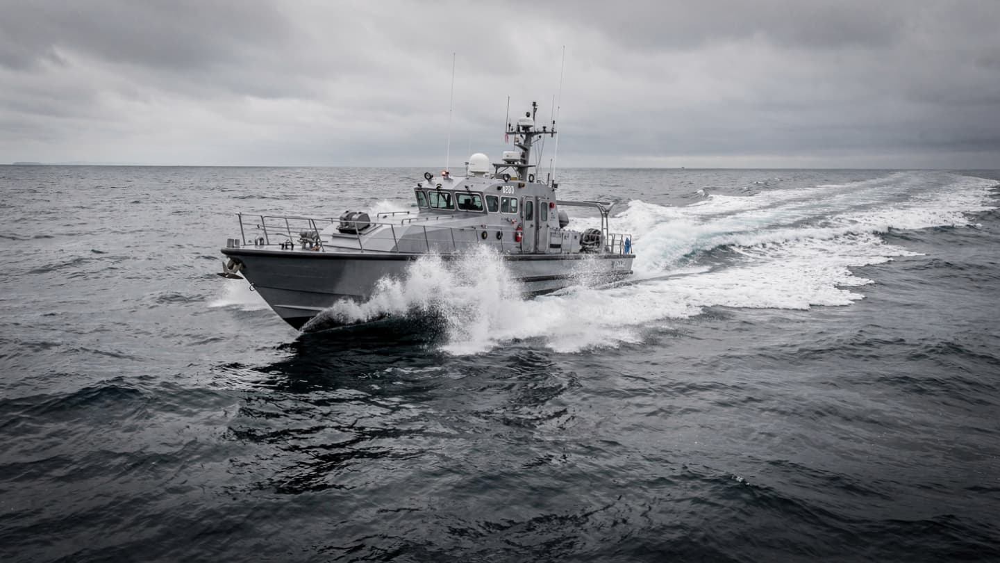 When the Roar of the Engine Meets the Resolute Silence of the Coastal Guard