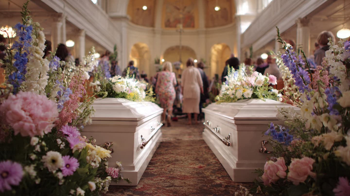 Eight Small Coffins Carried the Silence of a City