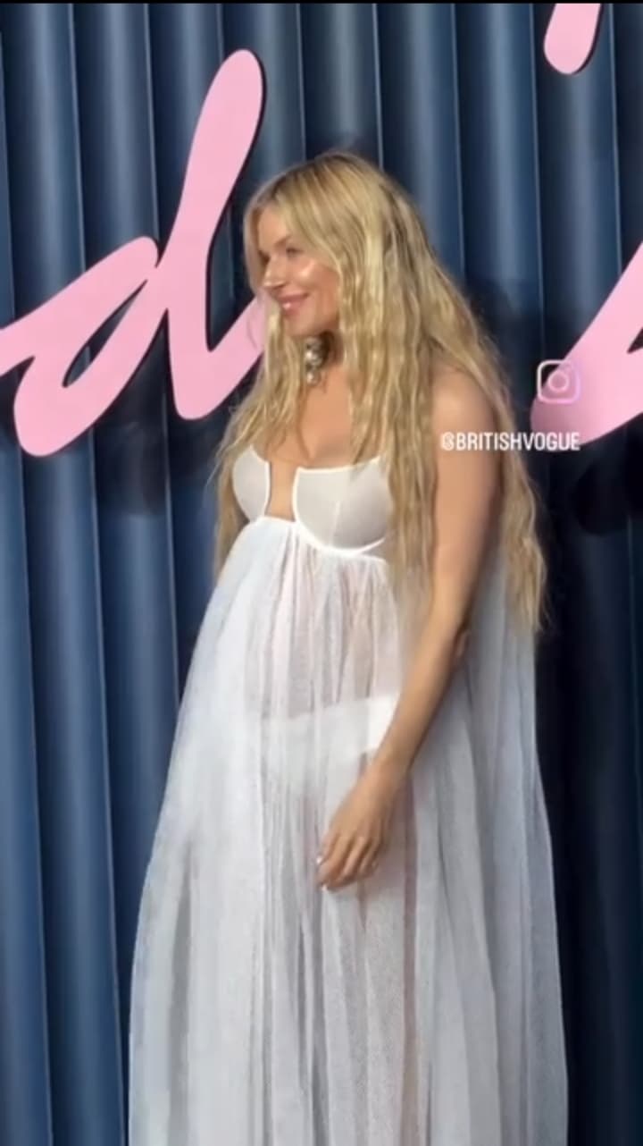 Sienna Miller Debuts Baby Bump at The Fashion Awards Red Carpet