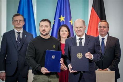 Germany to Restrict Asylum for Ukrainian Men as Kyiv and Berlin Sign Defense Pact